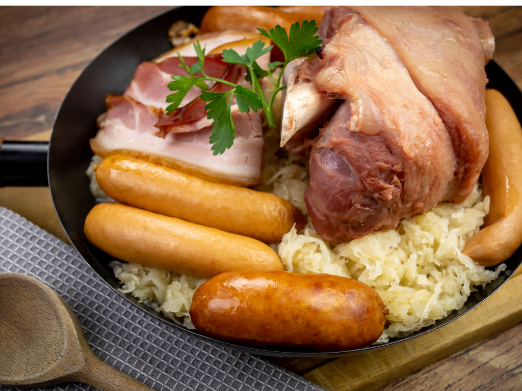 a plate of food on a wood surface